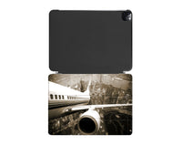 Thumbnail for Departing Aircraft & City Scene behind Designed iPad Cases