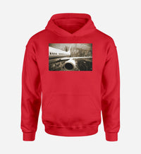 Thumbnail for Departing Aircraft & City Scene behind Designed Hoodies
