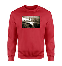 Thumbnail for Departing Aircraft & City Scene behind Designed Sweatshirts