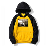Thumbnail for Departing Aircraft & City Scene behind Designed Colourful Hoodies