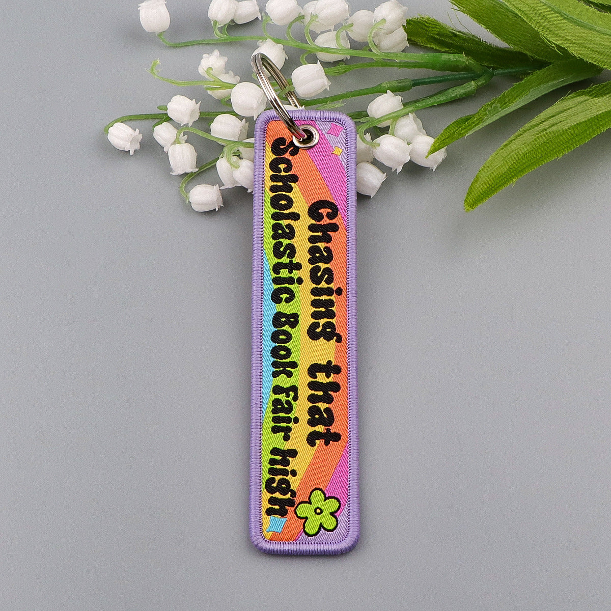 Chasing that Scholastic Book Fair high Designed Key Chains