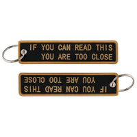 Thumbnail for IF YOU CAN READ THIS YOU ARE TOO CLOSE Designed Key Chains