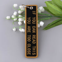 Thumbnail for IF YOU CAN READ THIS YOU ARE TOO CLOSE Designed Key Chains