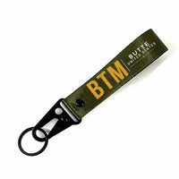 Thumbnail for Bert Mooney Airport (BTM) Hawk-Shaped Key Chains - Hawk Key Chain - Tag - Dark Green