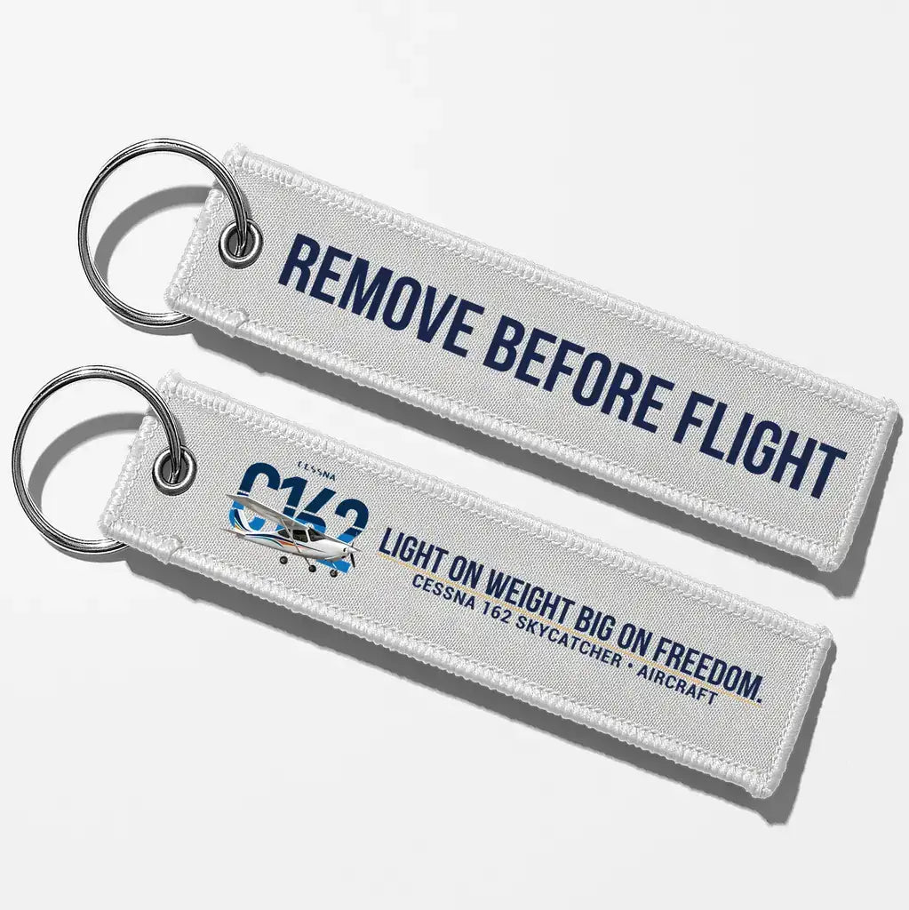 Cessna 162 Skycatcher Aviator Key Chains - White - Remove Before Flight