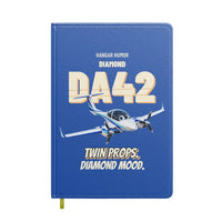 Thumbnail for Diamond DA42 - Twin props. Diamond mood. design on blue notebook