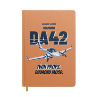Thumbnail for Diamond DA42 - Twin props. Diamond mood. design on orange notebook