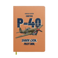 Thumbnail for Curtiss P-40E Warhawk - Shark grin. Pilot win. design on orange notebook