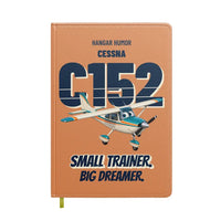 Thumbnail for Cessna 152 - Small trainer. Big dreamer. design on orange notebook