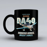 Thumbnail for Diamond DA40 - Diamond wings. Bright things. design on black ceramic mug