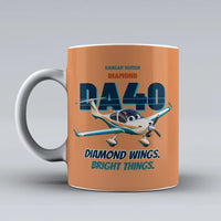 Thumbnail for Diamond DA40 - Diamond wings. Bright things. design on orange ceramic mug