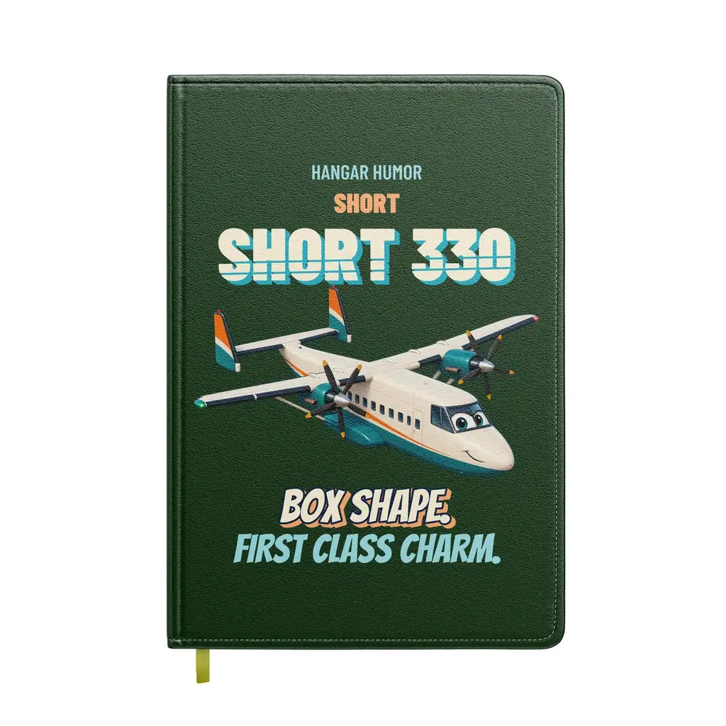 Short 330 - Box shape. First class charm. design on dark green notebook