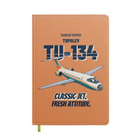Thumbnail for Tupolev Tu-134A - Classic jet. Fresh attitude. design on orange notebook
