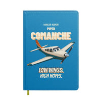 Thumbnail for Piper PA-24-250 Comanche - Low wings. High hopes. design on turquoise notebook