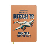 Thumbnail for Beechcraft D18S - Twin tails. Timeless tales. design on orange notebook