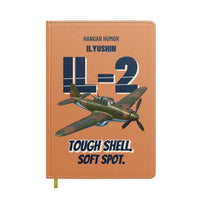 Thumbnail for Ilyushin Il-2M3 - Tough shell. Soft spot. design on orange notebook