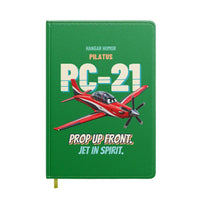 Thumbnail for Pilatus PC-21 - Prop up front. Jet in spirit. design on green notebook
