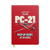 Thumbnail for Pilatus PC-21 - Prop up front. Jet in spirit. design on red notebook