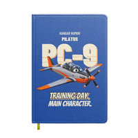 Thumbnail for Pilatus PC-9M - Training day. Main character. design on blue notebook