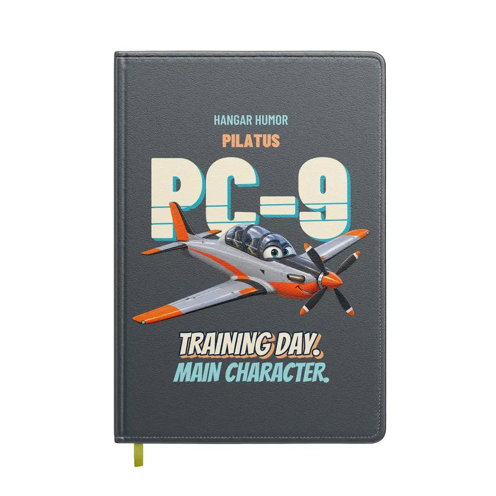 Pilatus PC-9M - Training day. Main character. design on gray notebook