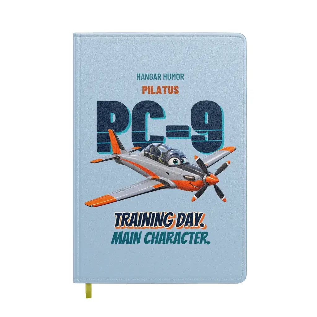 Pilatus PC-9M - Training day. Main character. design on light blue notebook