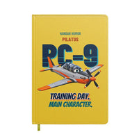 Thumbnail for Pilatus PC-9M - Training day. Main character. design on yellow notebook