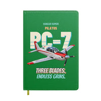 Thumbnail for Pilatus PC-7 - Three blades. Endless grins. design on green notebook