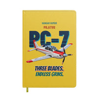 Thumbnail for Pilatus PC-7 - Three blades. Endless grins. design on yellow notebook
