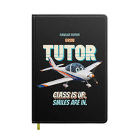 Thumbnail for Grob G 115E Tutor - Class is up. Smiles are in. design on black notebook