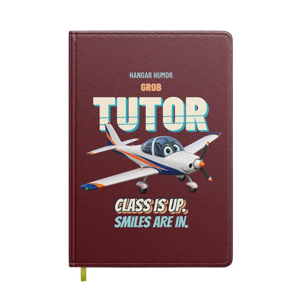 Grob G 115E Tutor - Class is up. Smiles are in. design on dark red notebook