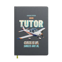 Thumbnail for Grob G 115E Tutor - Class is up. Smiles are in. design on gray notebook