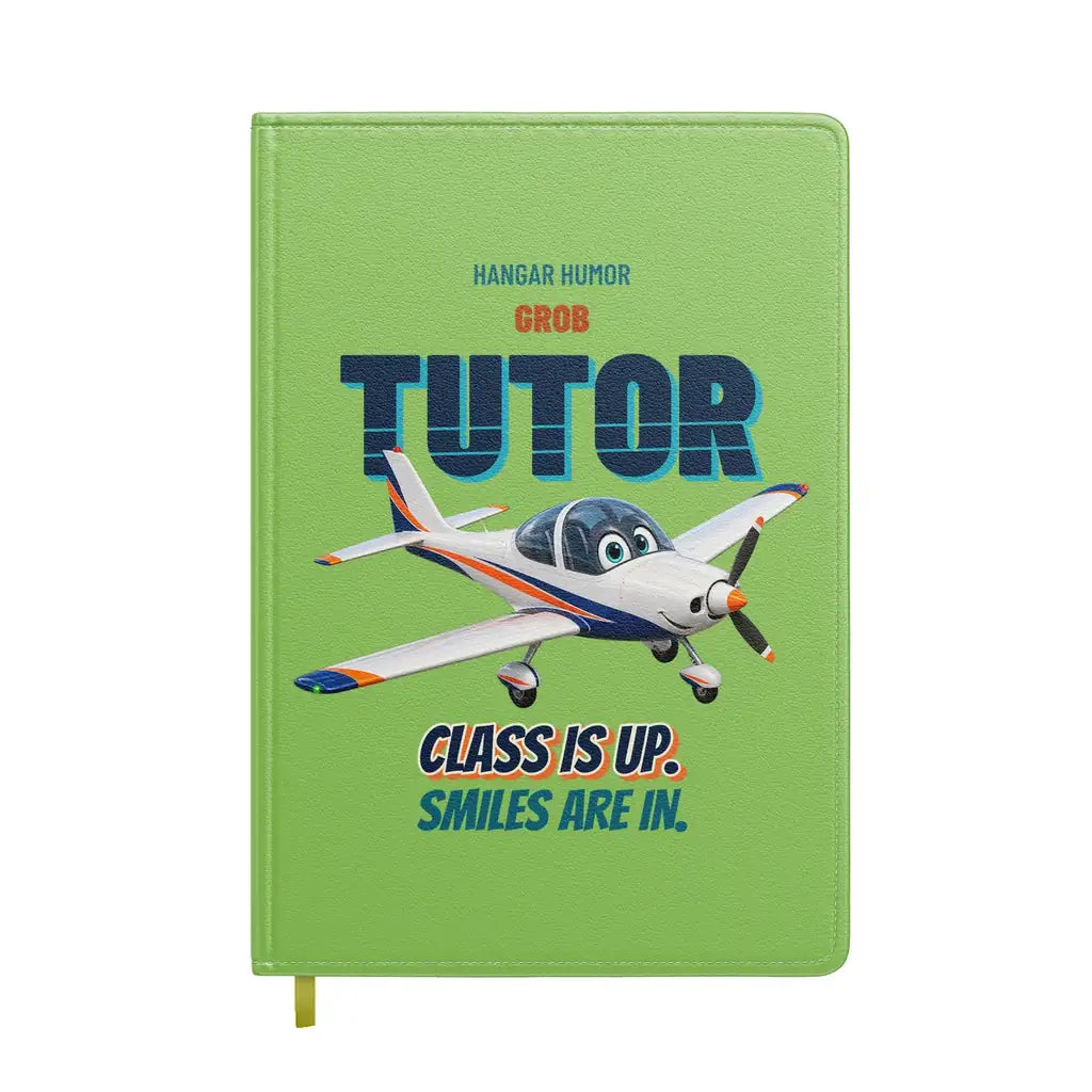 Grob G 115E Tutor - Class is up. Smiles are in. design on light green notebook