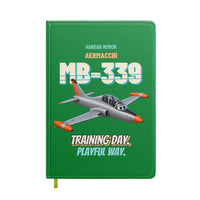 Thumbnail for Aermacchi MB-339A - Training day. Playful way. design on green notebook