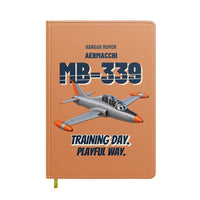 Thumbnail for Aermacchi MB-339A - Training day. Playful way. design on orange notebook