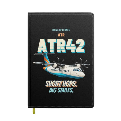 ATR 42-600 - Short hops. Big smiles. design on black notebook