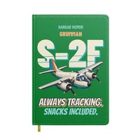 Thumbnail for Grumman S-2F Tracker - Always tracking. Snacks included. design on green notebook