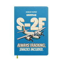 Thumbnail for Grumman S-2F Tracker - Always tracking. Snacks included. design on turquoise notebook