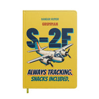 Thumbnail for Grumman S-2F Tracker - Always tracking. Snacks included. design on yellow notebook