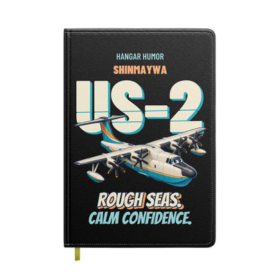 ShinMaywa US-2 - Rough seas. Calm confidence. design on black notebook