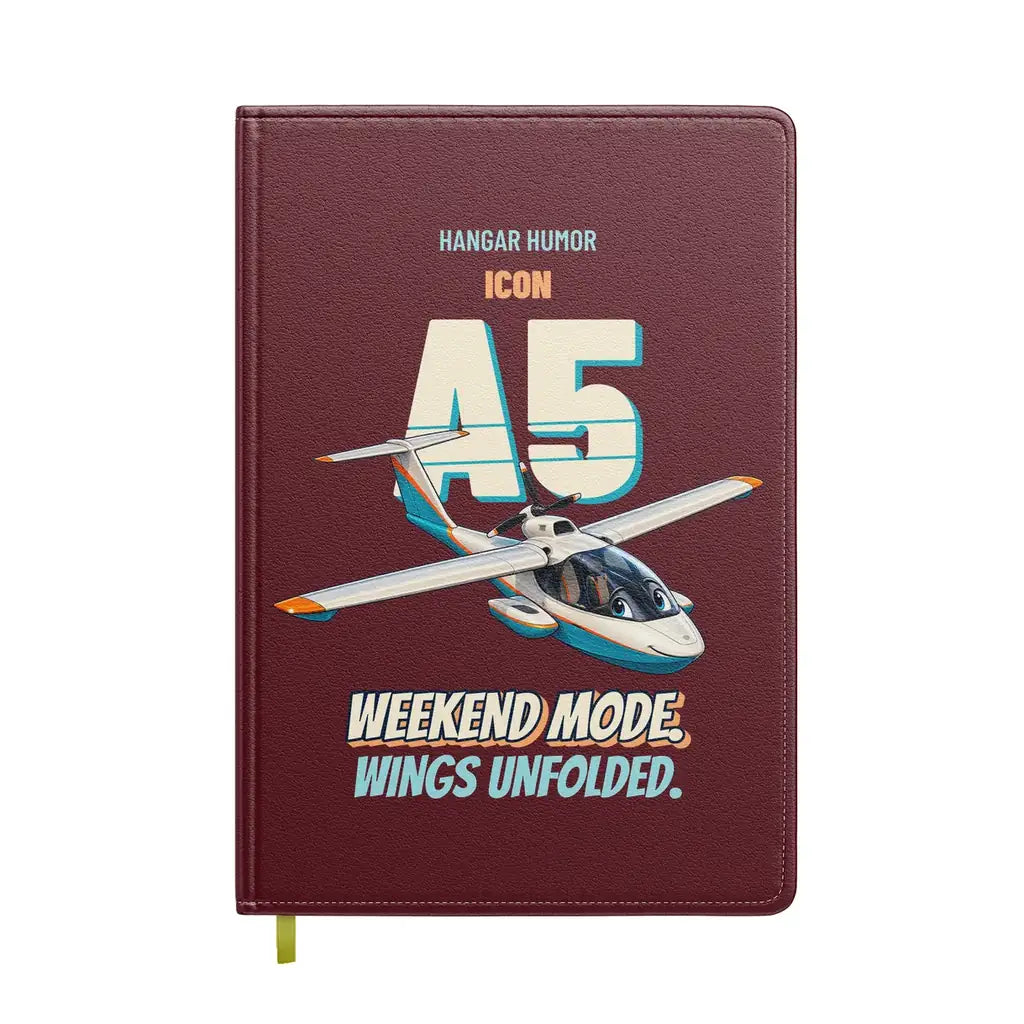 ICON A5 - Weekend mode. Wings unfolded. design on dark red notebook