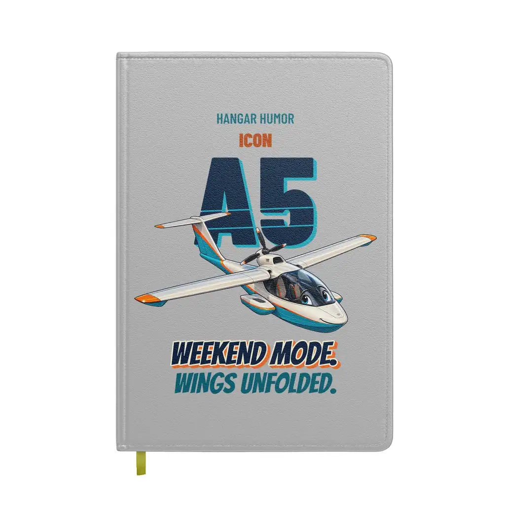ICON A5 - Weekend mode. Wings unfolded. design on light gray notebook