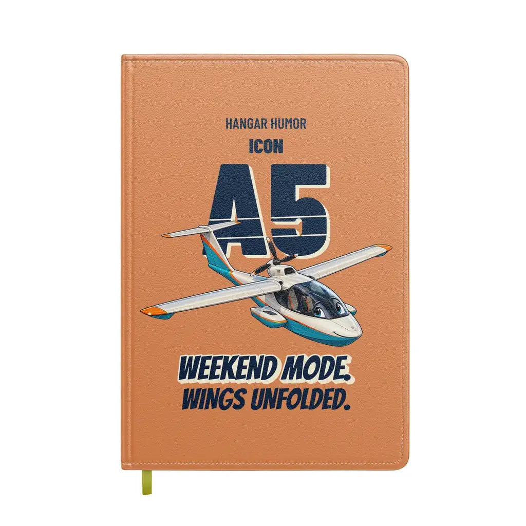 ICON A5 - Weekend mode. Wings unfolded. design on orange notebook