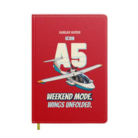 Thumbnail for ICON A5 - Weekend mode. Wings unfolded. design on red notebook