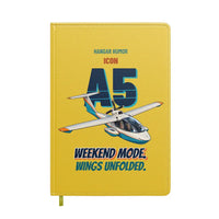 Thumbnail for ICON A5 - Weekend mode. Wings unfolded. design on yellow notebook