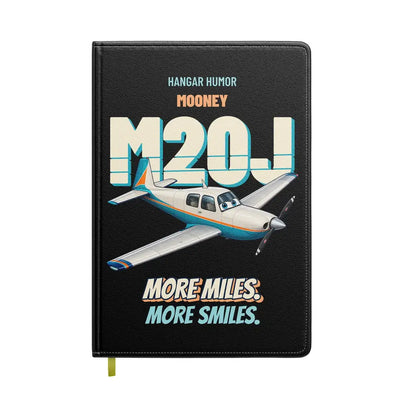 Mooney M20J - More miles. More smiles. design on black notebook