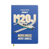 Thumbnail for Mooney M20J - More miles. More smiles. design on blue notebook