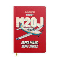 Thumbnail for Mooney M20J - More miles. More smiles. design on red notebook