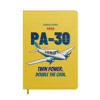 Thumbnail for Piper PA-30 Twin Comanche - Twin power. Double the grin. design on yellow notebook
