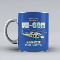Thumbnail for Sikorsky UH-60M Black Hawk - Heavy duty. Light hearted. design on blue ceramic mug