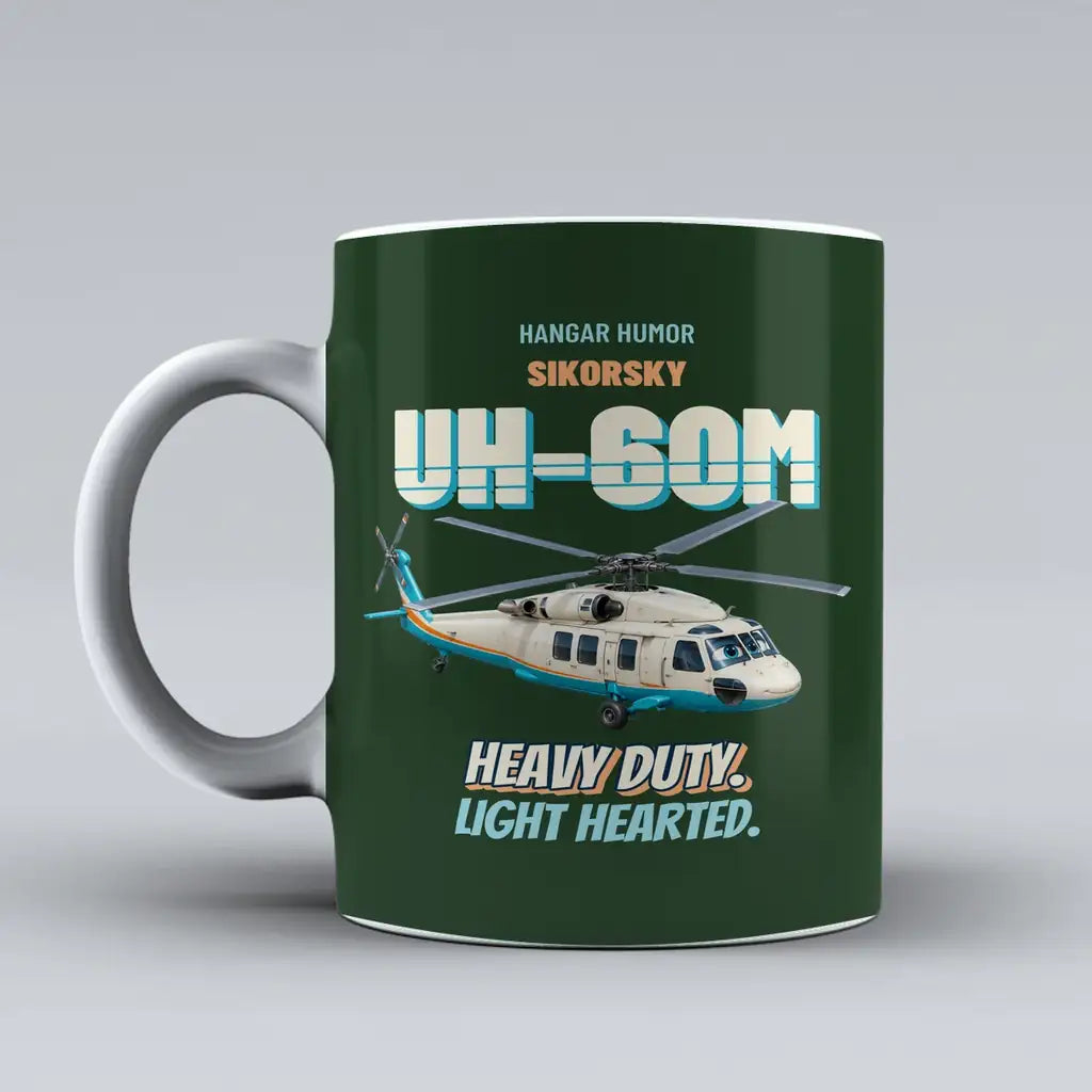 Sikorsky UH-60M Black Hawk - Heavy duty. Light hearted. design on dark green ceramic mug